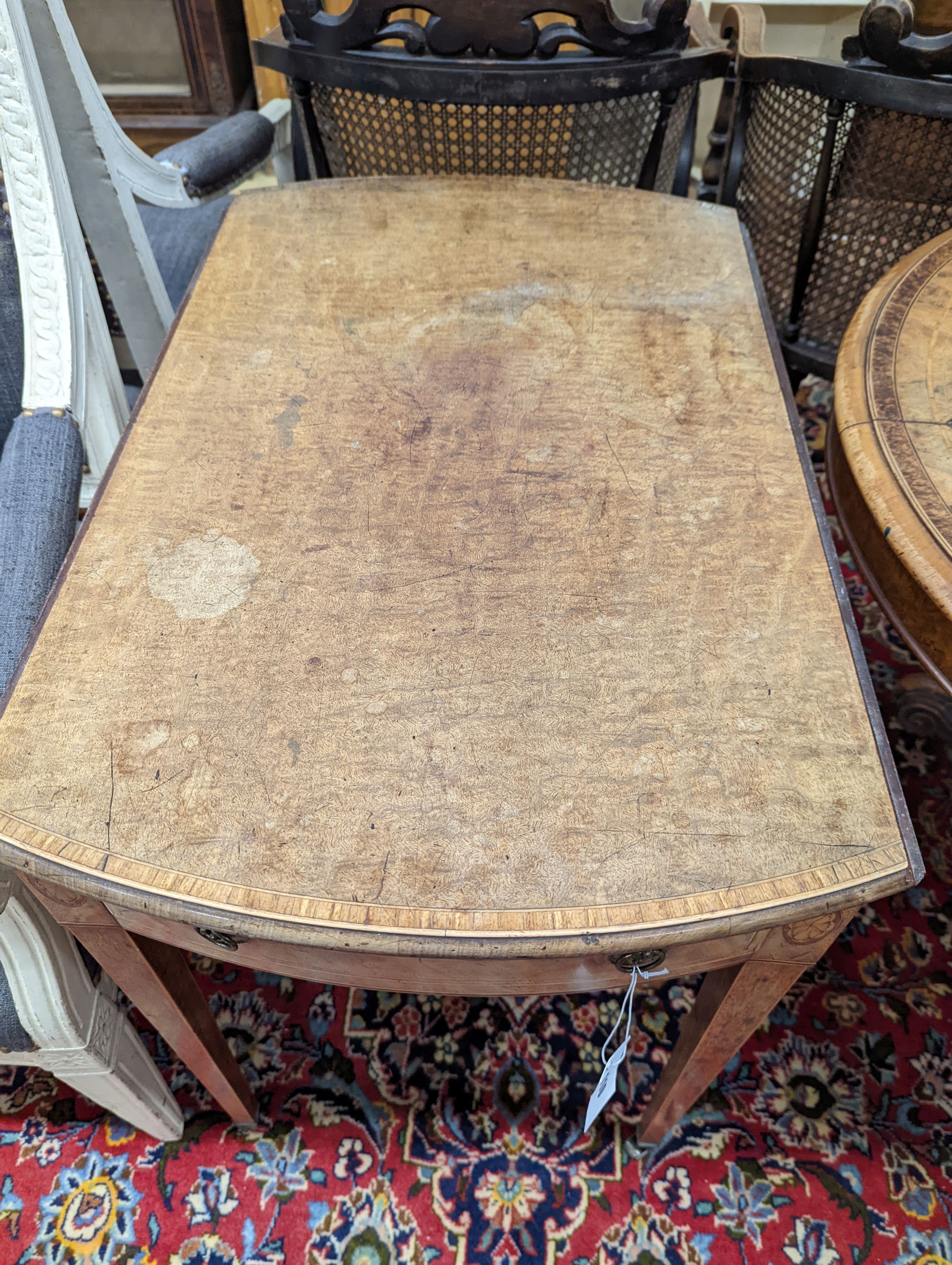 A George III satinwood banded mahogany oval topped Pembroke table, width 48cm, depth 70cm, height 71cm